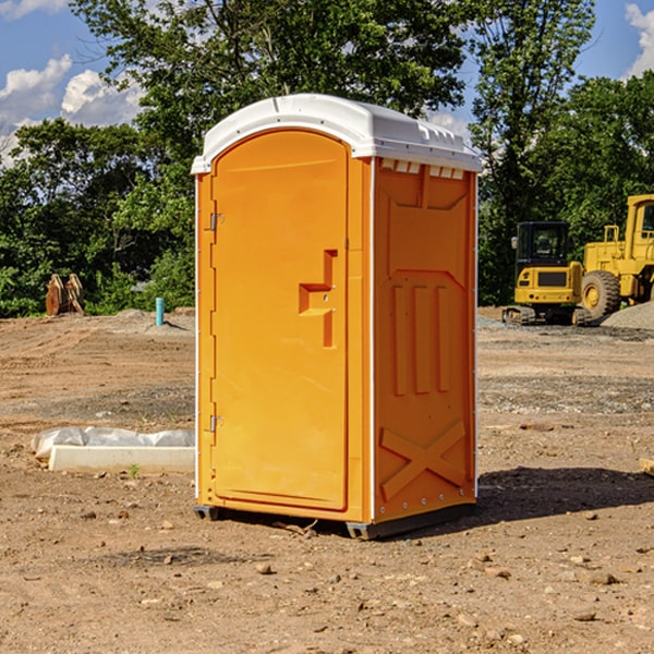 how often are the portable restrooms cleaned and serviced during a rental period in Big Lake